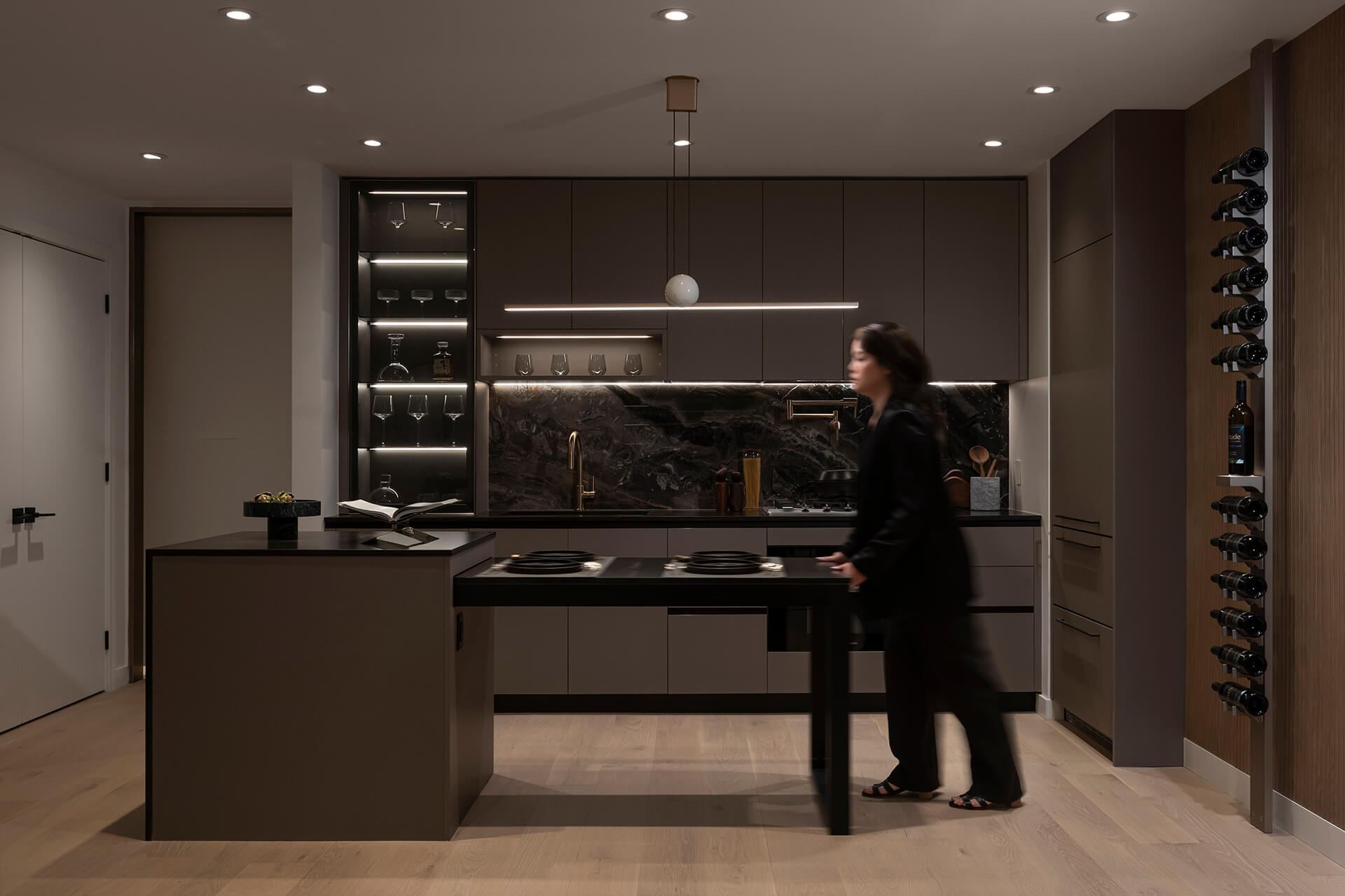 Kitchen island extending into a dining table